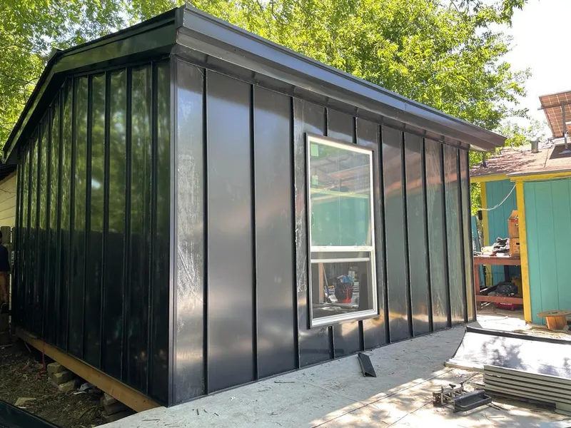 Black standing seam metal wall panels for Roof Inspection in Bloomfield