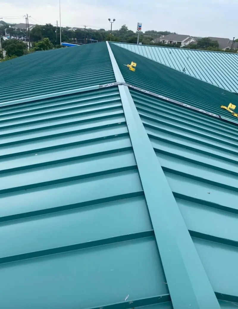Green commercial metal roof ridge and valley for Metal Roof Repair in Bloomfield
